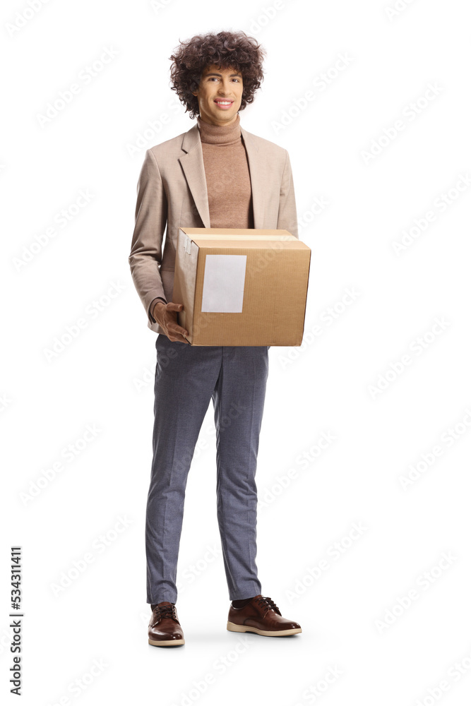 Full length portrait of a young elegant man holding a cardboard box Full length portrait of a young elegant man holding a cardboard box