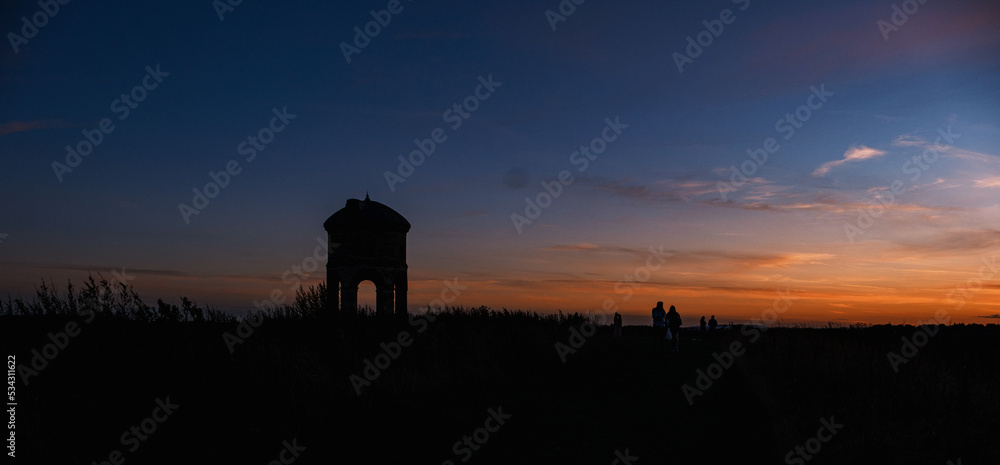 silhouette of a person in a field silhouette of a person in a field