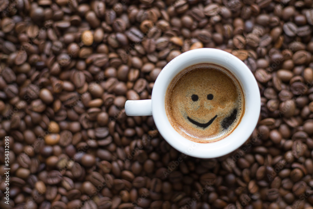 Cup of coffee on coffee beans background Cup of coffee on coffee beans background