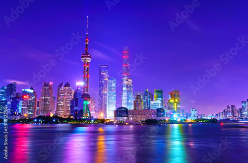 View of the skyline along the riverside at night in Shanghai  China.