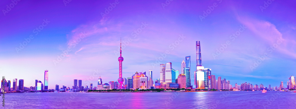 View of the skyline along the riverside at dusk in Shanghai, China. View of the skyline along the riverside at dusk in Shanghai, China.