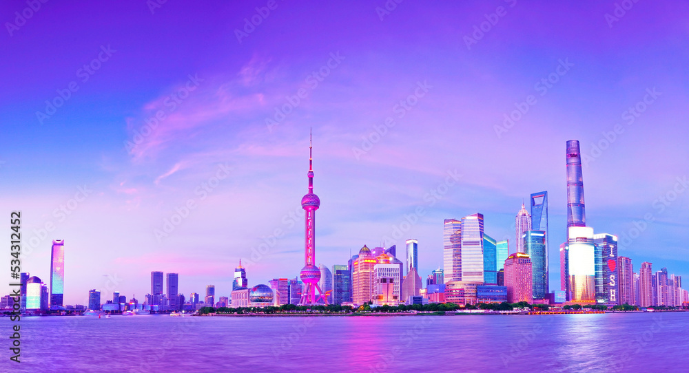 View of the skyline along the riverside at dusk in Shanghai, China. View of the skyline along the riverside at dusk in Shanghai, China.