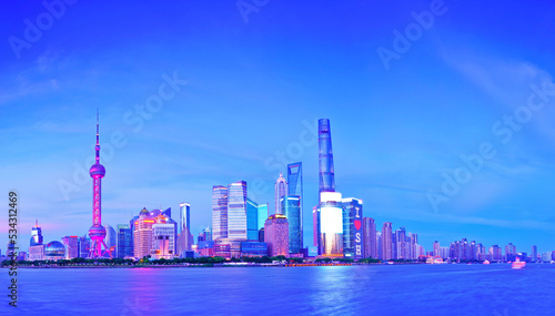 View of the skyline along the riverside at dusk in Shanghai  China.