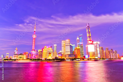 View of the skyline along the riverside at night in Shanghai  China.