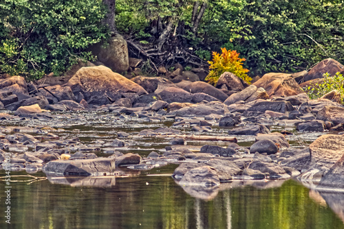 Vegetation defines the color of the flowing water, , Thunder Bay, ON, Canada photo