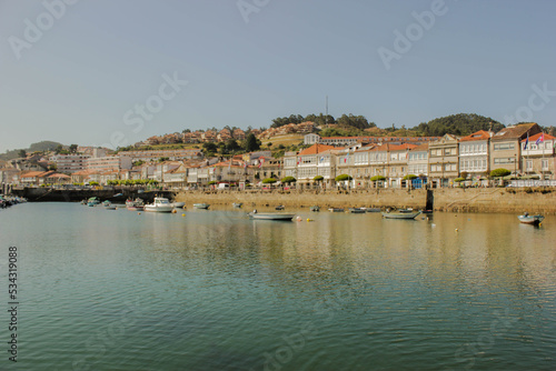 landscape of Baiona, Spain seen from the beach on a sunny day photo