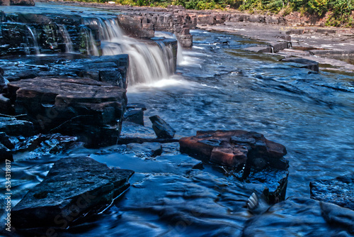 Water flow captured over time has its own glitter - Trowbridge Falls, Thunder Bay, ON, Canada