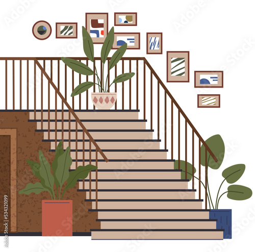 Interior design and decoration of hallway. Staircase at entrance to house decorated with pictures and plants. Corridor or hall of building with stairs and door. Cat lying on staircase with houseplants