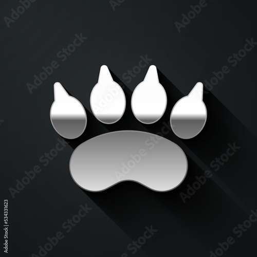 Silver Bear paw footprint icon isolated on black background. Long shadow style. Vector