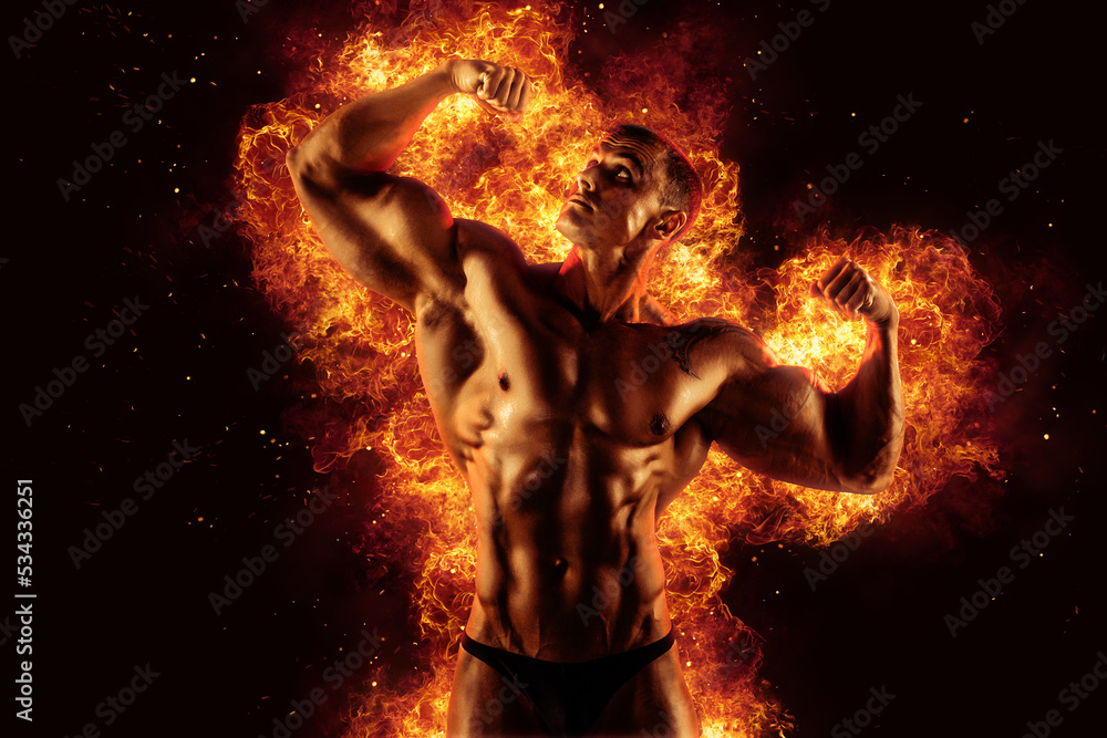 Bodybuilder posing on the fire flames background Stock Photo Adobe Stock