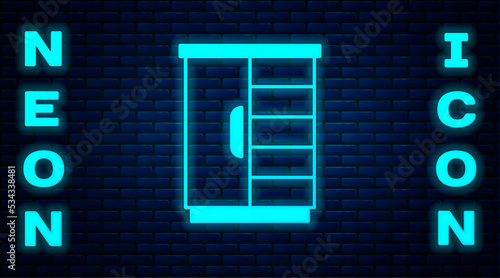 Glowing neon Wardrobe icon isolated on brick wall background. Cupboard sign. Vector