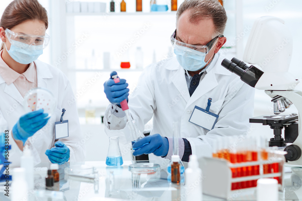 close up. scientists are testing a new vaccine. close up. scientists are testing a new vaccine.