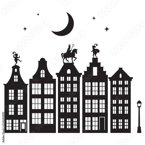 Celebration Dutch holidays - Saint Nicholas or Sinterklaas is coming to town at night - silhouette