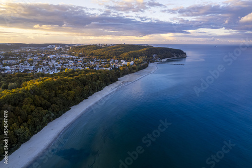Gdynia Orłowo - a beautiful sunset near the wooden pier in Orłowo, shot from a drone © blesz