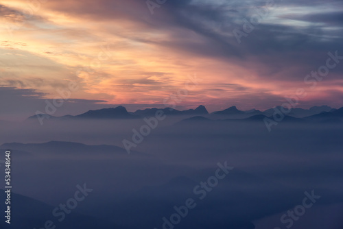 Canadian Mountain Landscape on the West Coast of Pacific Ocean. Dramatic Sunset and Hazy Smoky Sky. St. Mark's Summit near Vancouver, British Columbia, Canada. Nature Background
