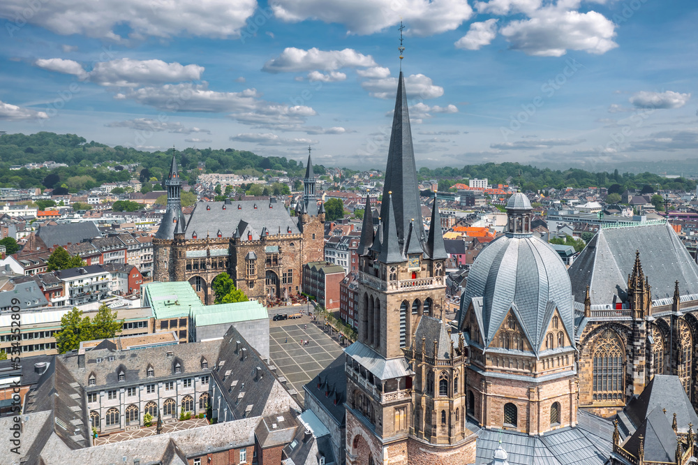 Cityscape of Aachen (Germany). Aerial view of Aachen Cathedral (German: Aachener Dom) with Katschhof square and Town Hall (Rathaus) in background