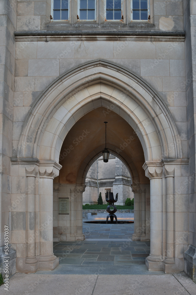 Usa, District of Columbia. Washington National Cathedral, arched entry to the Cathedral Garth. The Garth is enclosed by the cloister, the cathedral and the administration building.