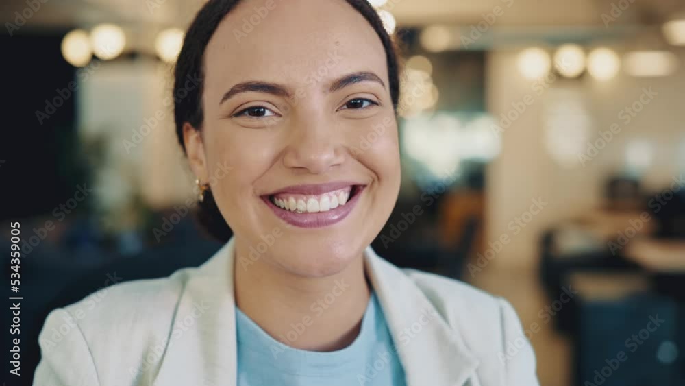 Close-up video of a lovely successful confident brazilian or hispanic woman, in formal wear, business lady, top manager of company, sits in the office, looks at camera, with a sincere positive smile Close-up video of a lovely successful confident brazilian or hispanic woman, in formal wear, business lady, top manager of company, sits in the office, looks at camera, with a sincere positive smile