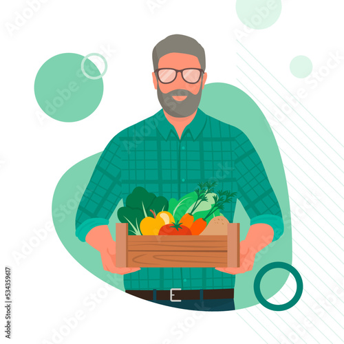 Traditional farmer holding a crate with fresh organic produce