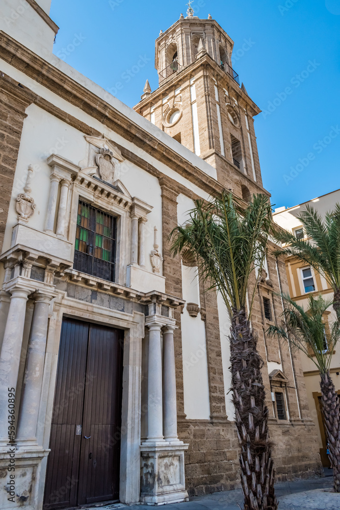 Perspective of the facade of the Church of Santiago Apostle (Iglesia Santiago Apostol) with the bell tower in Cathedral Square, Cádiz SPAIN