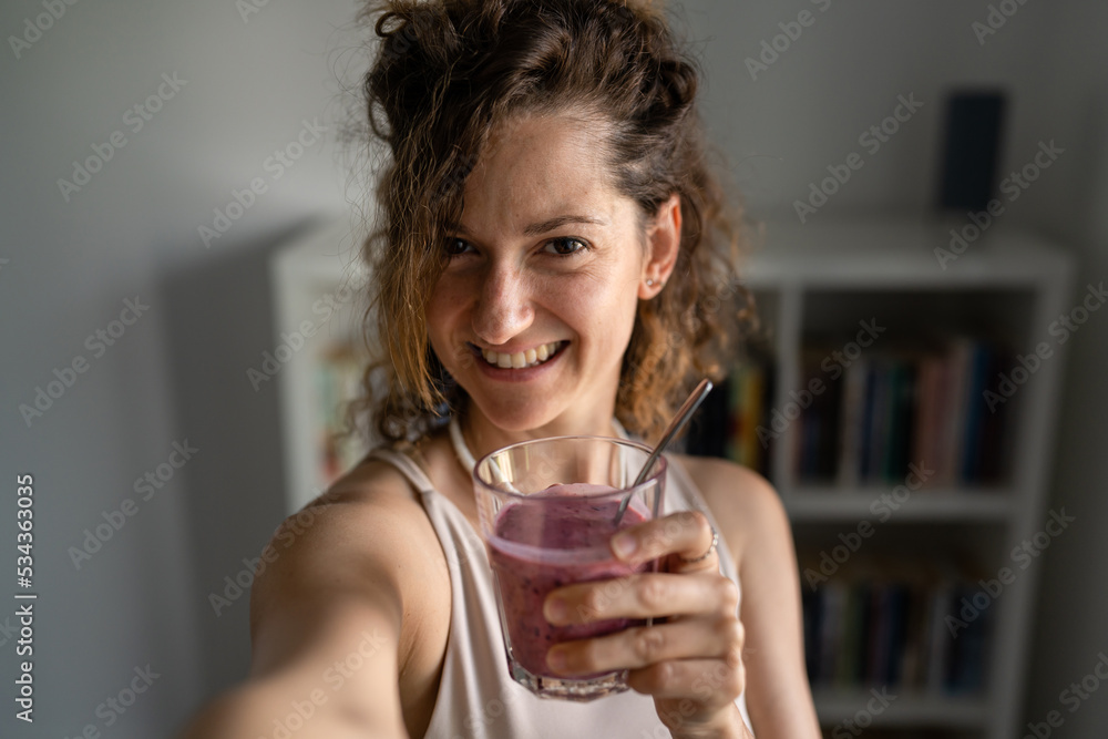 One young woman drinking healthy fruit smoothie healthy lifestyle One young woman drinking healthy fruit smoothie healthy lifestyle