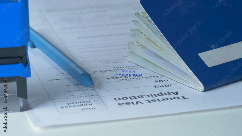 Student visa approved stamp in application form with passport. Border agency on checkpoint. Department of homeland security, emigration and immigration. Politics and government, travel permit Student visa approved stamp in application form with passport. Border agency on checkpoint. Department of homeland security, emigration and immigration. Politics and government, travel permit