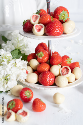  white chocolate covered strawberries  fresh strawberries and white floweers