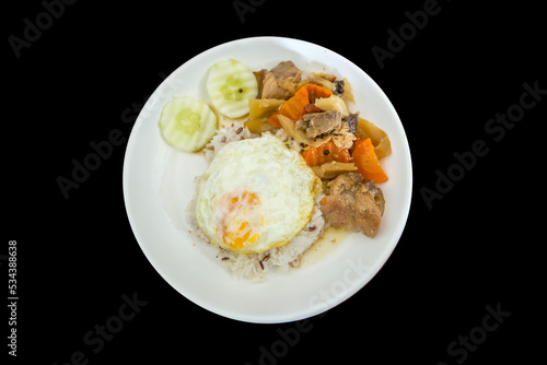 Top view of Braised Pork Over Rice and Fried egg, focus selective