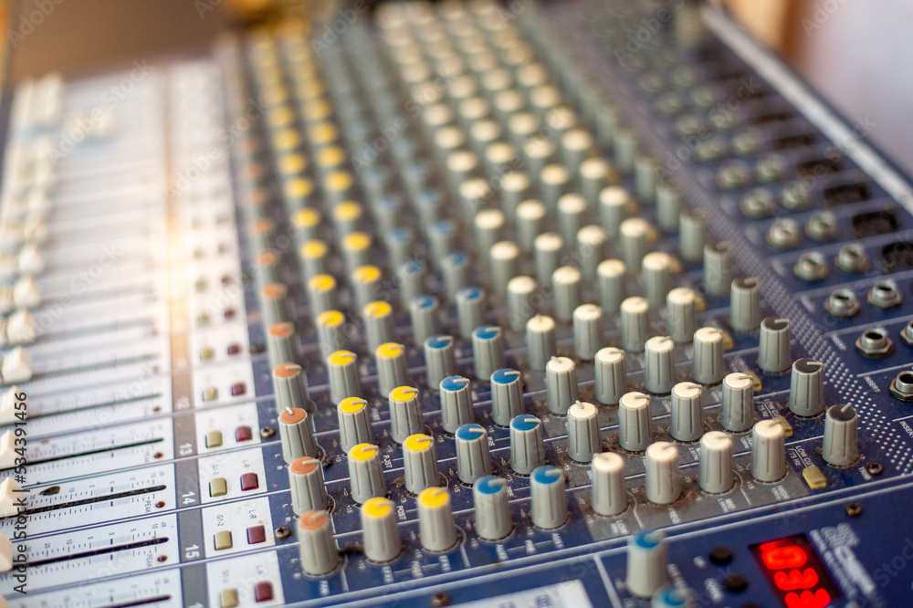 sound check for concert, mixer control, music engineer, backstage sound check for concert, mixer control, music engineer, backstage