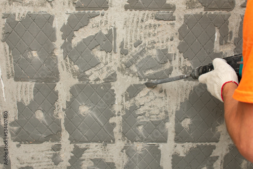 Concrete wall with tile adhesive residue