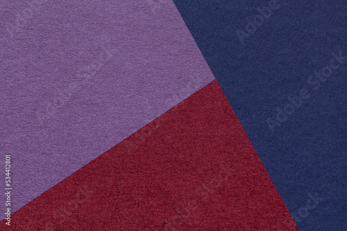 Texture of craft navy blue, wine and violet shade color paper background, macro. Vintage abstract cardboard