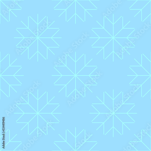 Seamless pattern with snowflakes on a blue background. Winter cold texture.