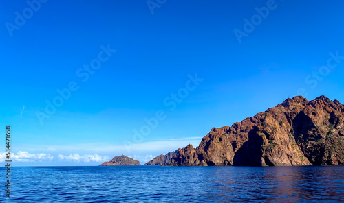 The Scandola Nature Reserve. South-west of Calvi, on the Cape Girolata peninsula. Beautiful coast of Corsica in September.