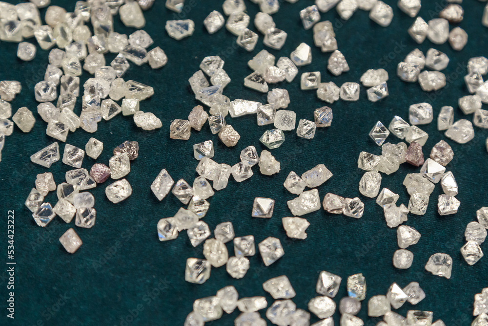 Assortment of beautiful raw diamonds. Assortment of beautiful raw diamonds.