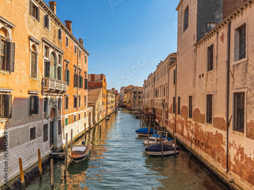 Venezia green water Lagoon and boat life embedded with mediterranean Architecture 