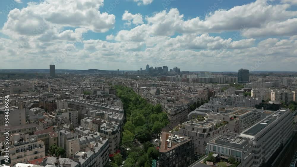 Paris 17th district or 17ème arrondissement with financial district skyscrapers in background, France. Aerial orbiting
Paris 17th district or 17ème arrondissement with financial district skyscrapers in background, France. Aerial orbiting