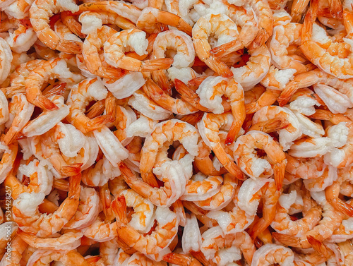 Cooked shrimp on the belt in the production line, shrimp industry