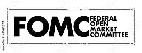 FOMC Federal Open Market Committee acronym - committee within the Federal Reserve System, conducts monetary policy for the U.S. central bank, text concept stamp