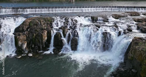 Willamette Falls Oregon City Oregon.   It is the largest waterfall in the Northwestern United States by volume, and the seventeenth widest in the world.  Horseshoe in shape, it is 1,500 feet wide.