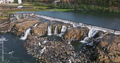 Willamette Falls Oregon City Oregon.   It is the largest waterfall in the Northwestern United States by volume, and the seventeenth widest in the world.  Horseshoe in shape, it is 1,500 feet wide.