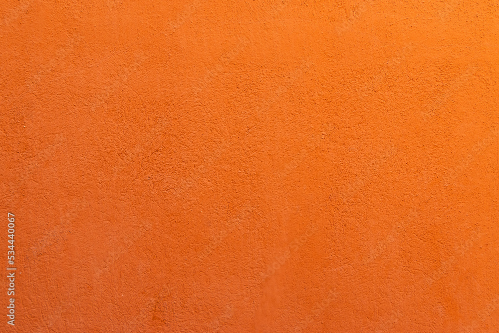 Orange painted wall texture background.