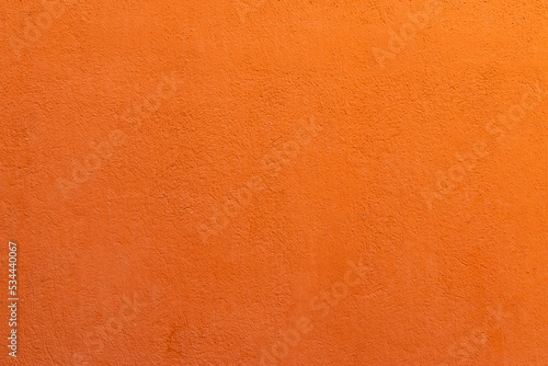 Orange painted wall texture background.