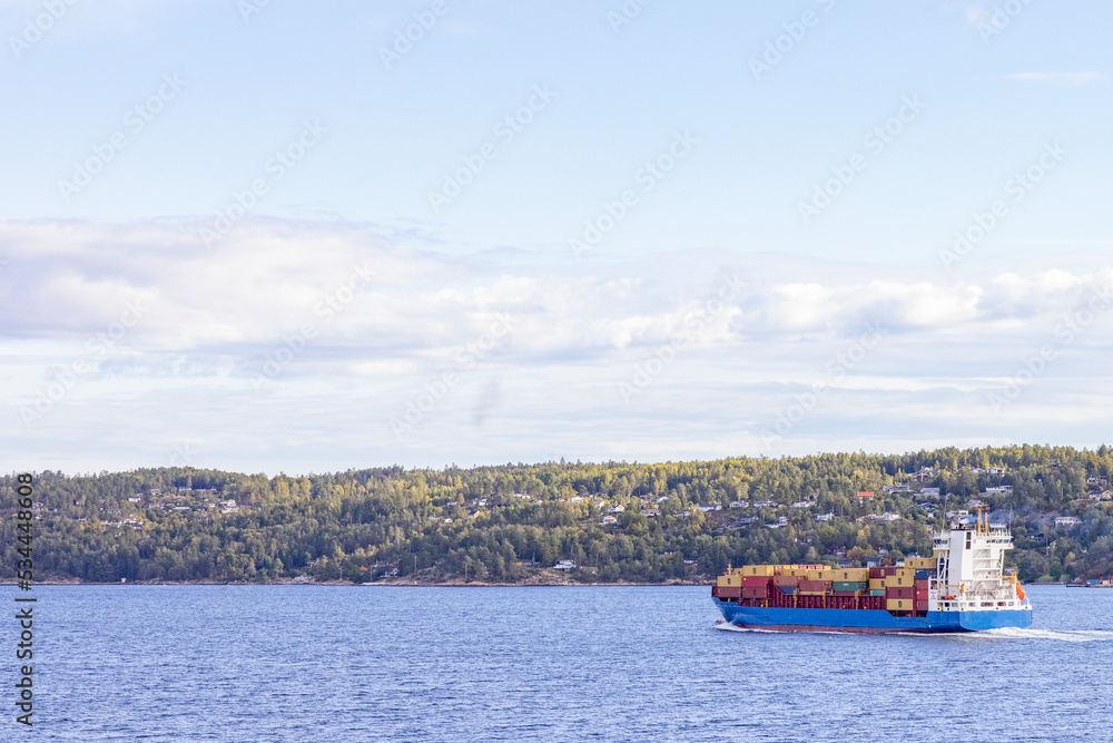 The container ship Mistral of Madeira through the Drøbakksundet on its way to Oslo,Norway,Europe