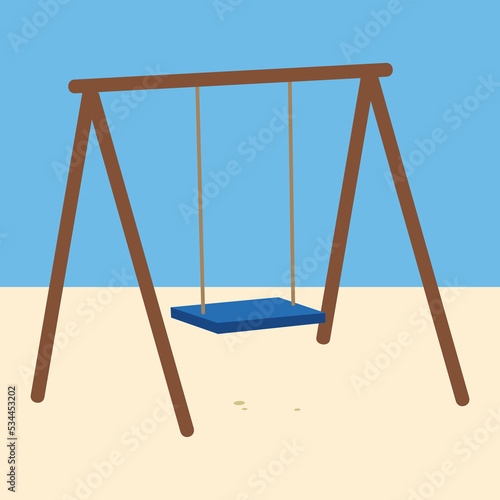 swing on the sand against the background of the sea