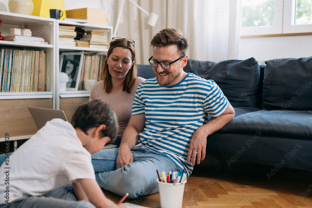family of three relaxing at home family of three relaxing at home