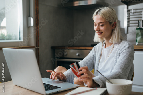 woman shopping online from her home