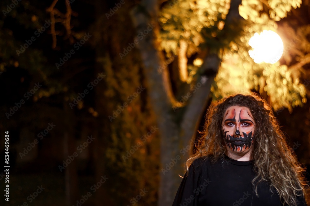 Portrait of woman with Halloween skull make up. Horror spooky skeleton visage concept Portrait of woman with Halloween skull make up. Horror spooky skeleton visage concept