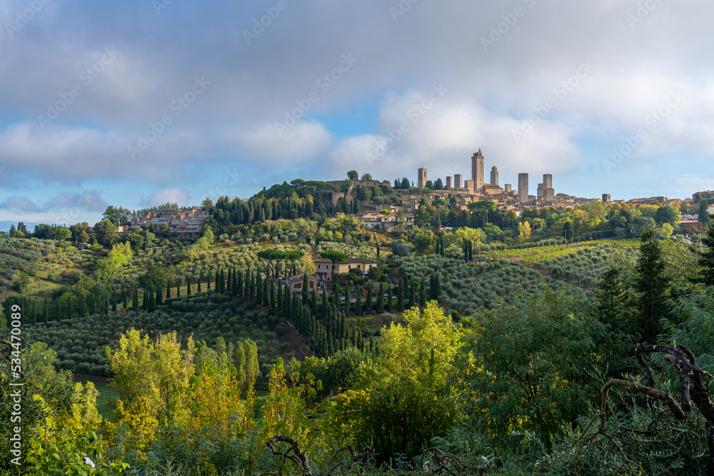 Beautiful view of the medieval town of San Gimignano in the Tuscany hills near Siena in Italy, Europe.