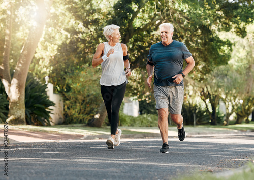 Road running, fitness and senior couple training together on a exercise and workout run. Sports and health motivation of elderly man and woman runner in retirement living a healthy lifestyle