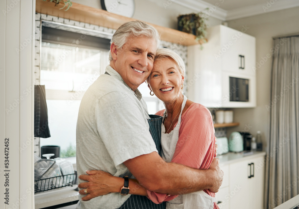 Obraz premium Love, hug and senior couple in the kitchen cooking dinner in a happy home enjoying retirement together at home. Romance, marriage and old woman hugging a romantic senior partner with a big smile